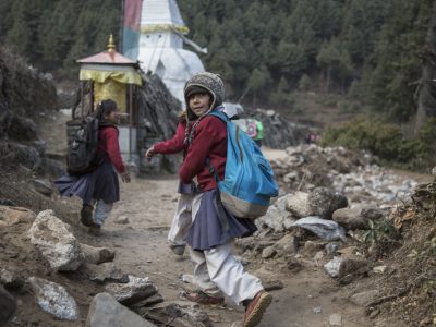 Suni Baraili, 7, walks home after school from Sano Gumela School to her house in the hills above Thulo Gumela, Nepal on February 22, 2016.